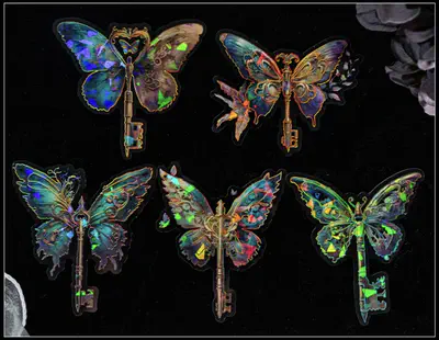 photo of shining, rainbow-colored butterfly stickers on a black background